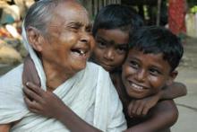 A grandmother laughs with her two grandsons in Howrah, India. © 2012 Susanta, Courtesy of Photoshare